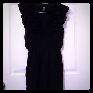 H&M Black ruffled romper with hidden pockets!